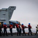 Nimitz Sailors Hold Phone and Distance Line