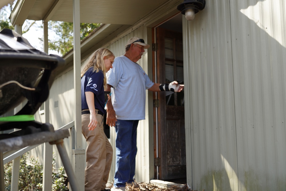 FEMA Corps Member Works with Survivor of Hurricane Helene