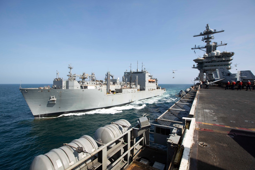 Abraham Lincoln conducts a replenishment-at-sea with Amelia Earhart