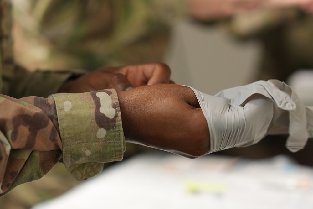 Fort Meade Garrison and U.S. Army Medical Department Activity Command Teams Receive Flu Shots