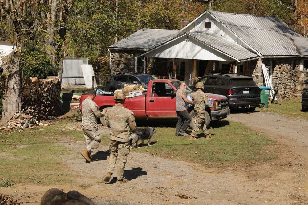 U.S. Army Soldiers deliver food, and water to civilians in need