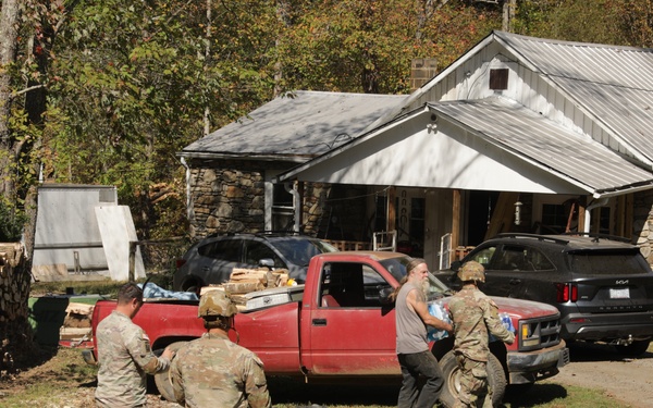 U.S. Army Soldiers deliver food, and water to civilians in need