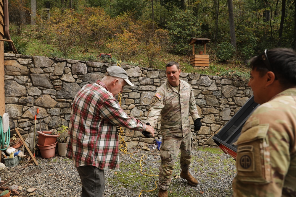 U.S. Army Soldiers deliver food, and water to civilians in need