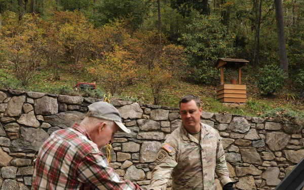U.S. Army Soldiers deliver food, and water to civilians in need