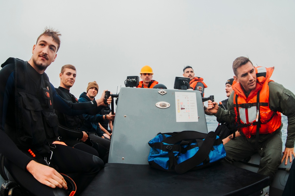 USS George Washington Sailors conduct small boat operations.