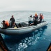 USS George Washington Sailors conduct small boat operations.