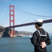 USS Tripoli Sailors man the rails while pullinig in to San Francisco