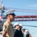 USS Tripoli Sailors man the rails while pulling into San Francisco