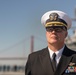 USS Tripoli Sailors man the rails while pulling into San Francisco