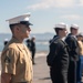 USS Tripoli Sailors man the rails while pulling into San Francisco