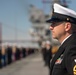 USS Tripoli Sailors man the rails while pulling into San Francisco