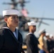 USS Tripoli Sailors man the rails while pulling into San Francisco