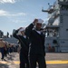 USS Tripoli Sailors man the rails while pullinig in to San Francisco