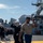 USS Tripoli Sailors man the rails while pulling in to San Francisco USS Tripoli Sailors man the rails while pulling in to San Francisco