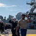 USS Tripoli Sailors man the rails while pullinig in to San Francisco