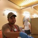 USS Tripoli sailors serve food at Saint Anthoneys