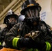 USS Tripolis sailors conduct fire dills with San francisco fire department