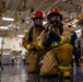 USS Tripolis sailors conduct fire dills with San francisco fire department