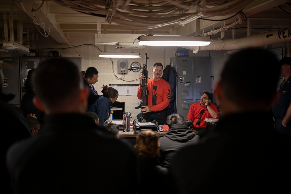 USS Tripoli Sailors Prepare for weapons qualifications