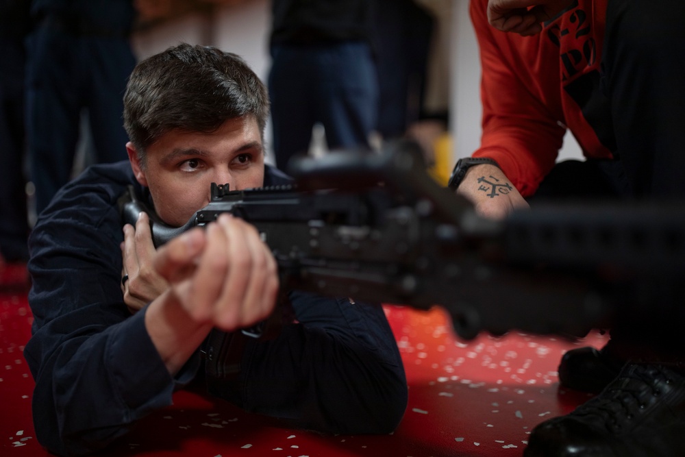 USS Tripoli Sailors Prepare for weapons qualifications