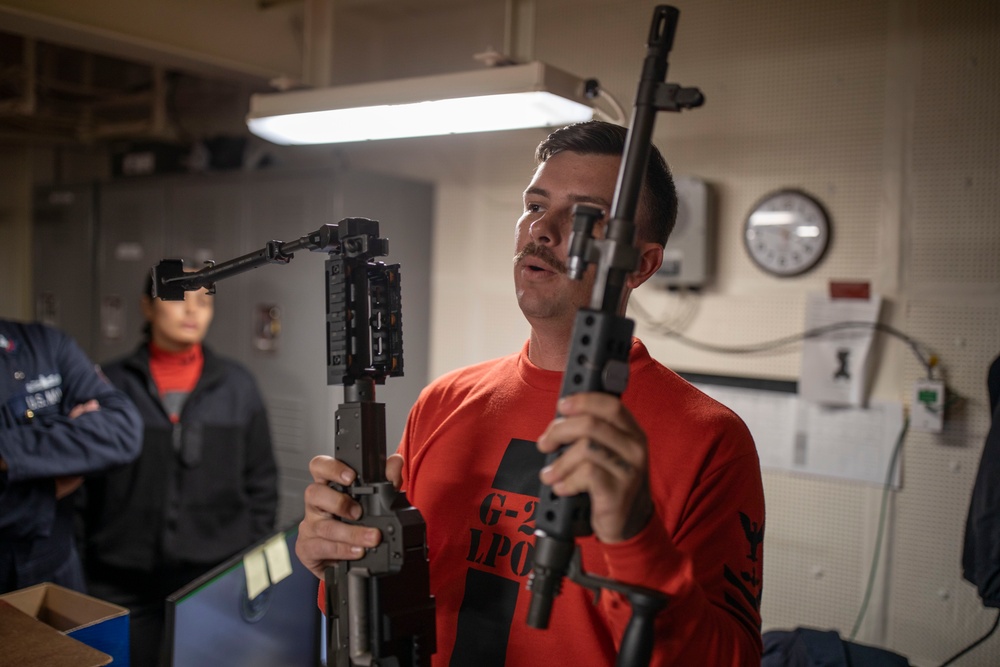 USS Tripoli Sailors Prepare for weapons qualifications