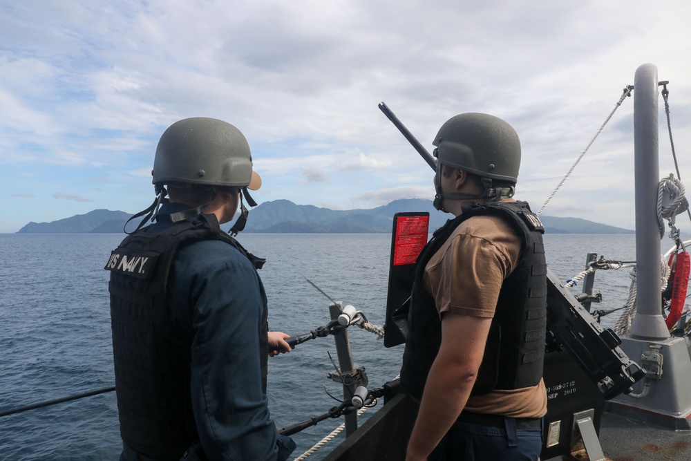 Sailors aboard the USS Howard conduct a sea and anchor detail in Subic Bay, Philippines