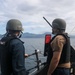 Sailors aboard the USS Howard conduct a sea and anchor detail in Subic Bay, Philippines