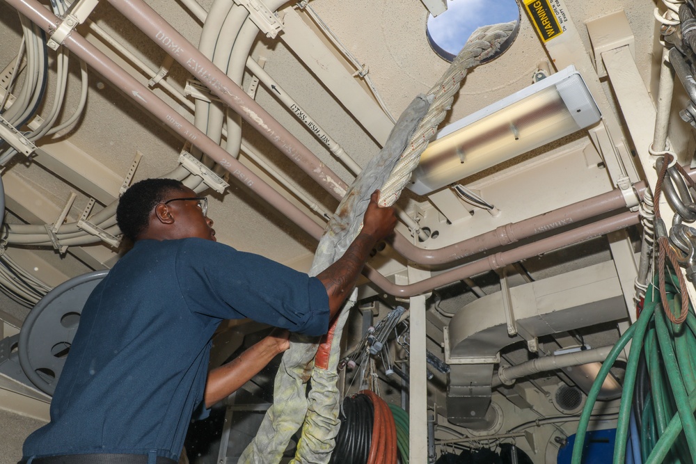 Sailors aboard the USS Howard conduct a sea and anchor detail in Subic Bay, Philippines