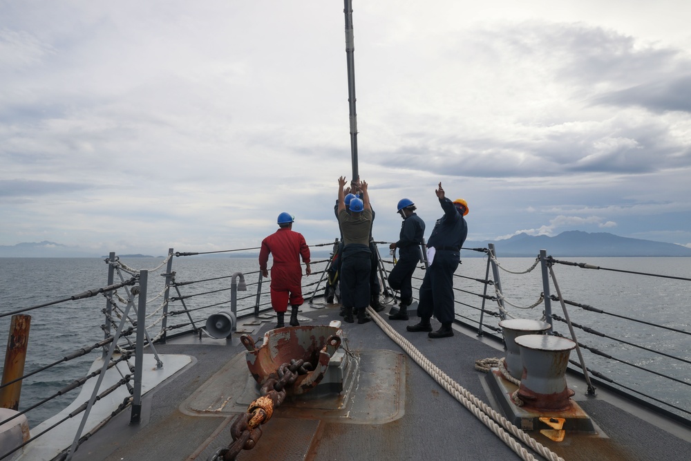 Sailors aboard the USS Howard conduct a sea and anchor detail in Subic Bay, Philippines