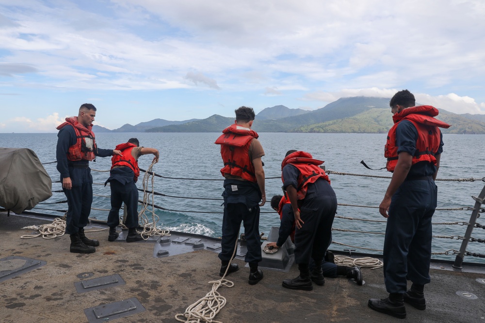 Sailors aboard the USS Howard conduct a sea and anchor detail in Subic Bay, Philippines