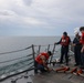 Sailors aboard the USS Howard conduct a sea and anchor detail in Subic Bay, Philippines