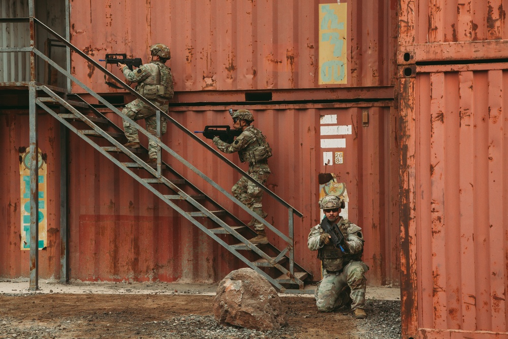French and U.S. forces conduct close quarter combat training.