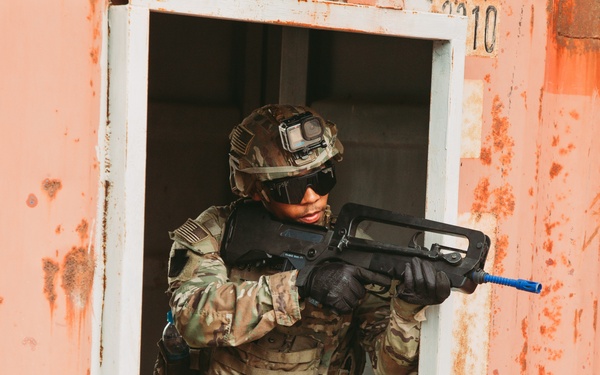 French and U.S. forces conduct close quarter combat training.
