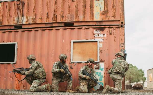 French and U.S. forces conduct close quarter combat training.