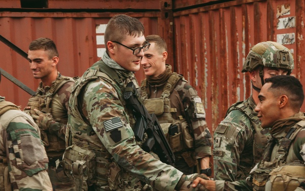 French and U.S. forces conduct close quarter combat training.