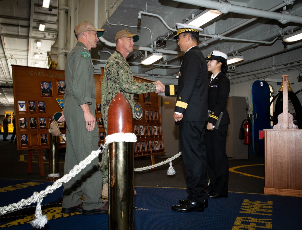 Midshipmen from ROK Naval Academy tour USS Carl Vinson