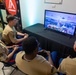U.S. Armed Service members participate in a San Francisco Fleet Week esports challenge