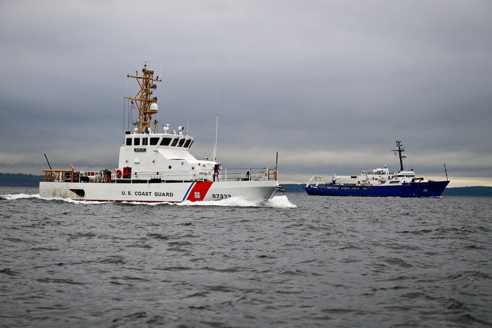 Coast Guard Cutter Adelie escorts Uruguay Naval Ship ROU Oyarvide through Puget Sound