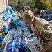 Screaming Eagles Soldiers assist volunteers at a church