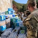 Screaming Eagles Soldiers assist volunteers at a church