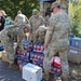 Screaming Eagles Soldiers assist volunteers at a church