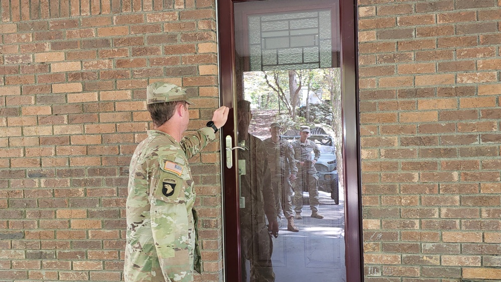 Screaming Eagles Soldiers conduct door-to-door welfare check