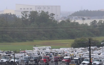 Power Restoration Trucks Prestage for Hurricane Milton Response