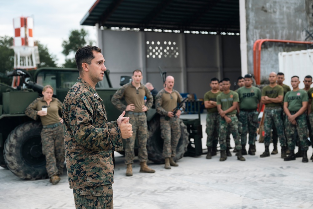 U.S., Philippine Marines conduct safety brief before loading Ospreys in Laoag to Support Relief Efforts Alongside Philippine Allies