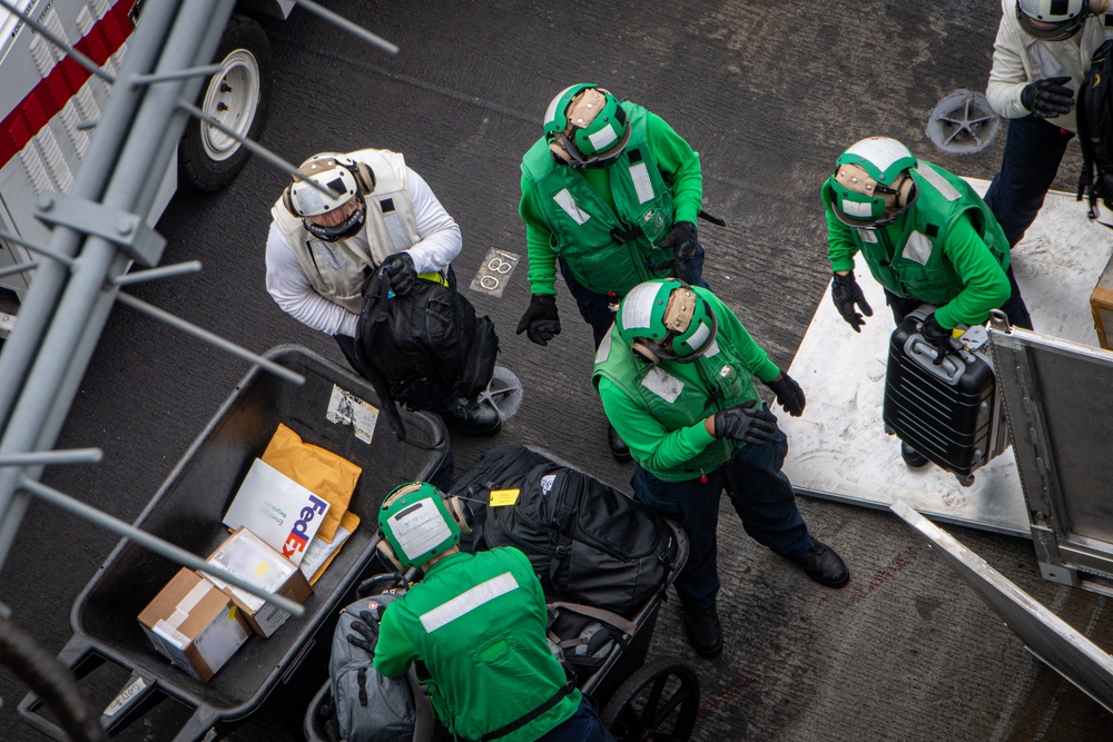 Nimitz Sailors Unload Mail