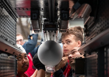 USS George Washington Sailors upload NATO Seasparrow Missile System