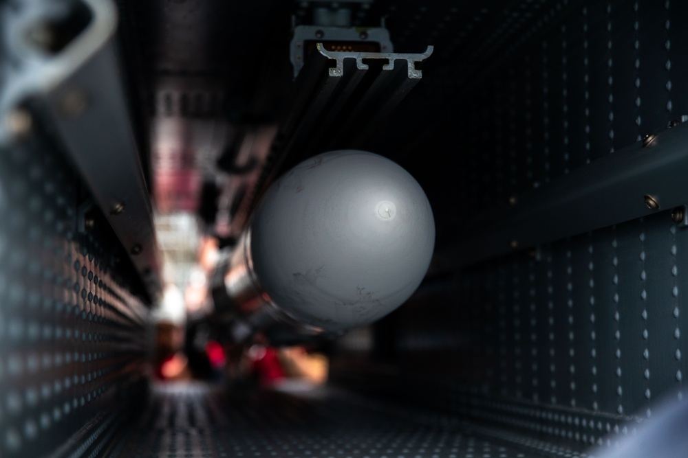 USS George Washington Sailors upload NATO Seasparrow Missile System