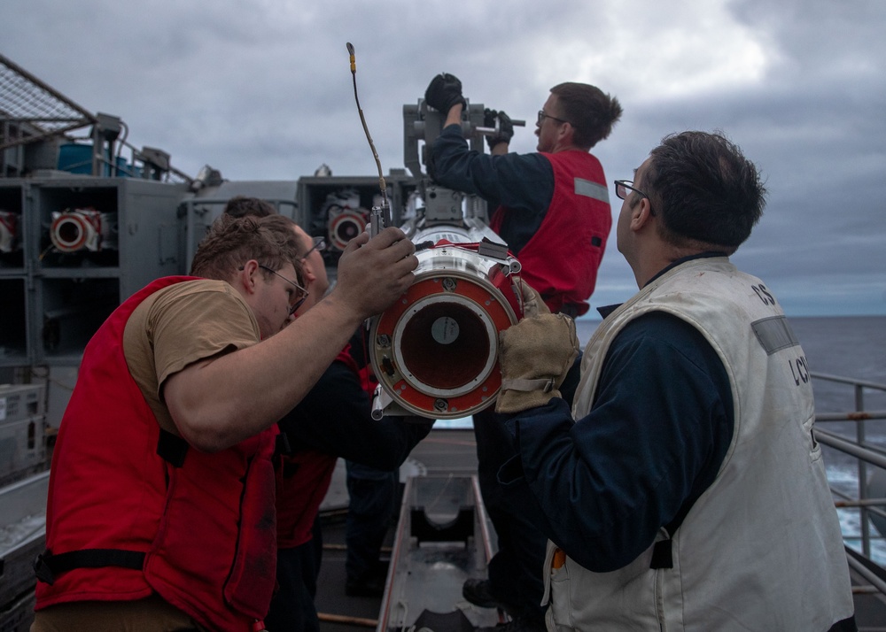 USS George Washington Sailors upload NATO Seasparrow Missile System