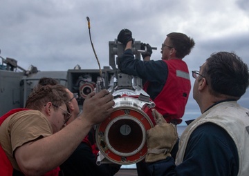 USS George Washington Sailors upload NATO Seasparrow Missile System