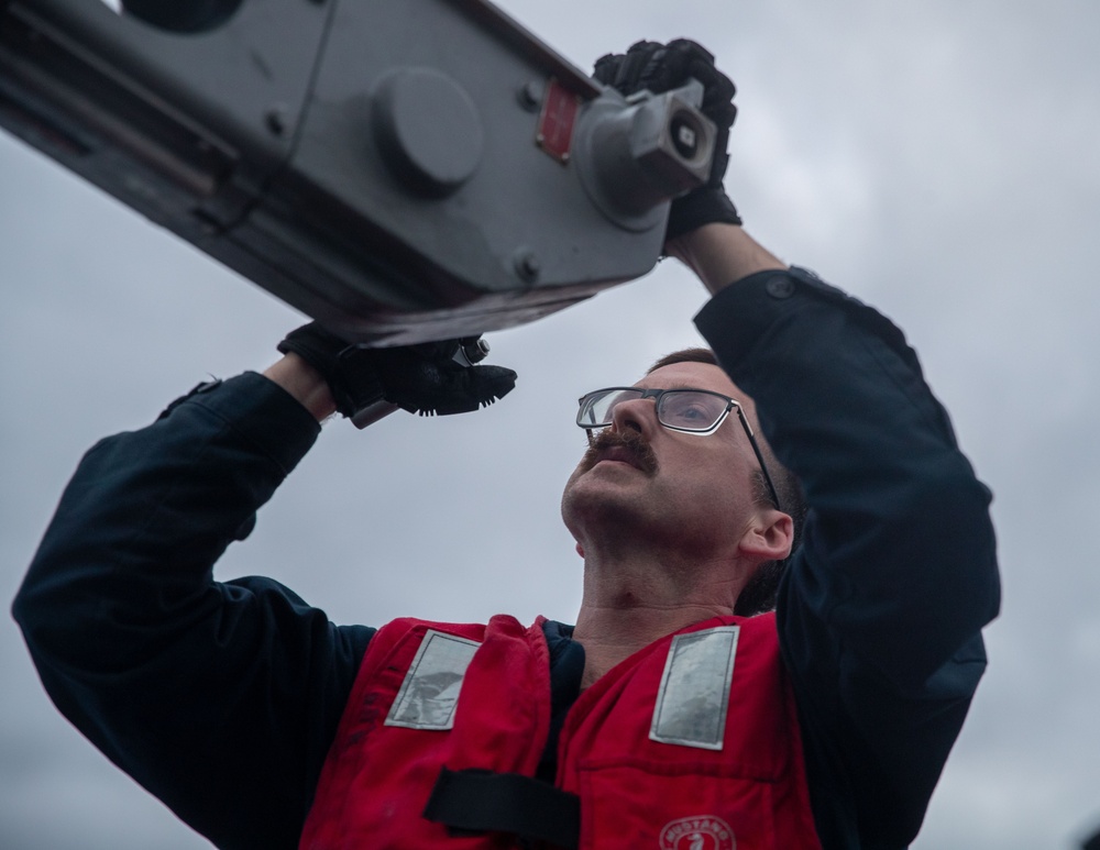 USS George Washington Sailors upload NATO Seasparrow Missile System